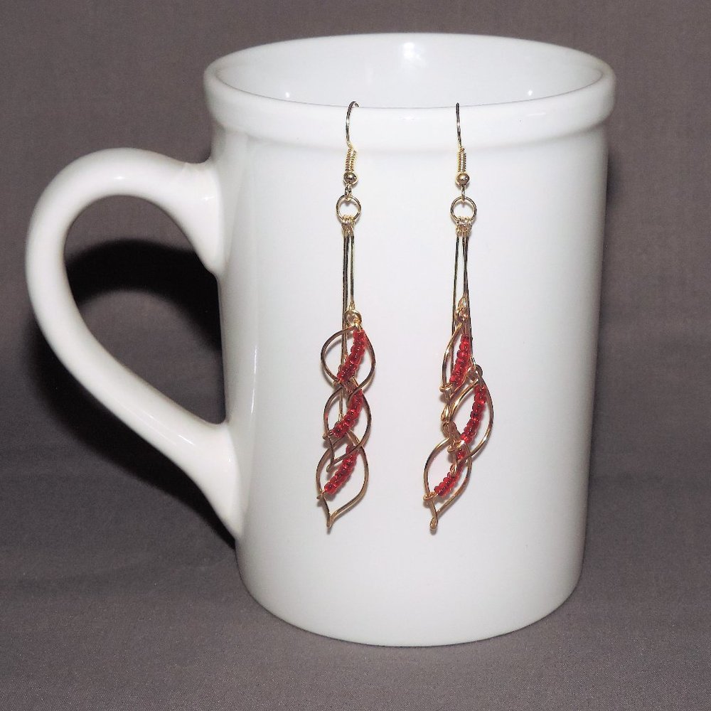 Handcrafted gold and red dangle earrings